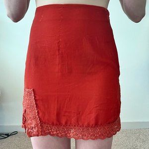 Urban Outfitters | Orange Velvet Mini Skirt with Lace Trim and Side Slit | XS